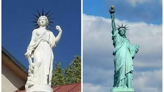 A la izquierda la estatua española de Ponciano Ponzano y a la derecha la estatua de la libertad de Frédéric Auguste Bartholdi.