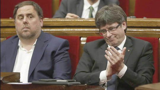 Junqueras (Conseller de Economía) i Puigdemont (President)